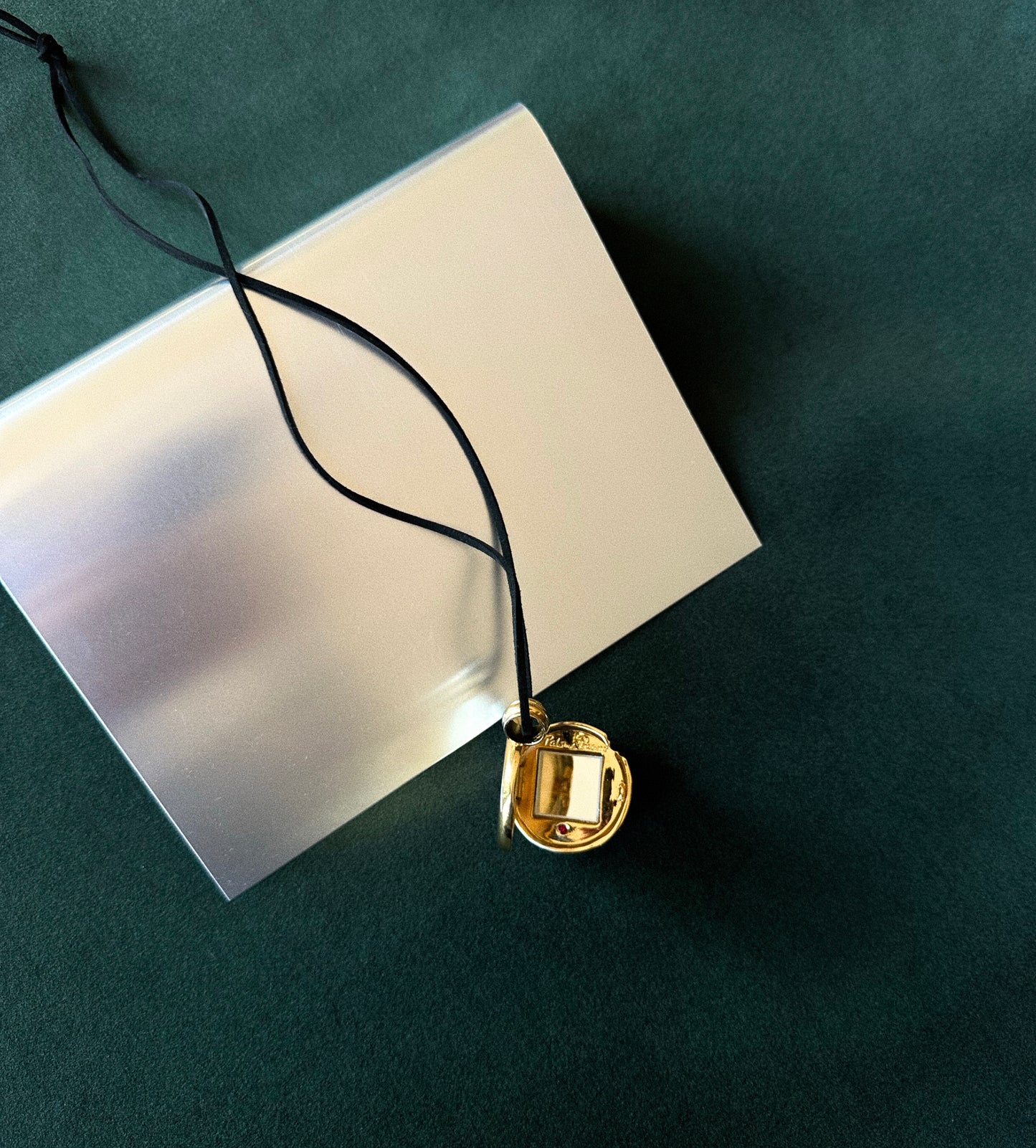 Lot 186: Vintage Paloma Picasso Mirror Locket Pendant