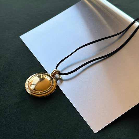 Lot 186: Vintage Paloma Picasso Mirror Locket Pendant
