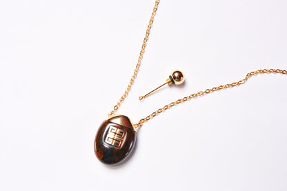 Lot 128: Vintage Givenchy Pendant
