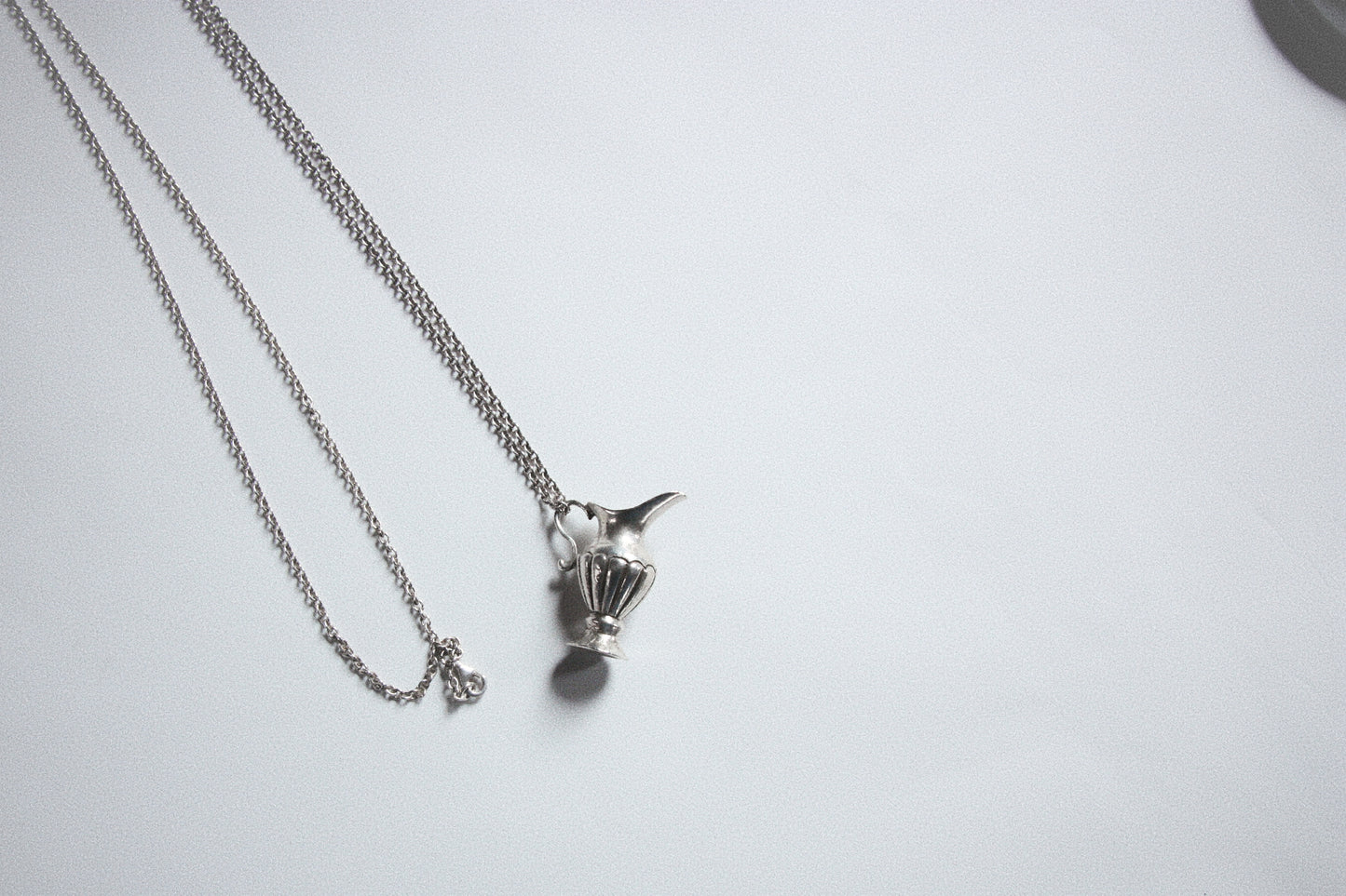 Lot 136: Jug Pendant