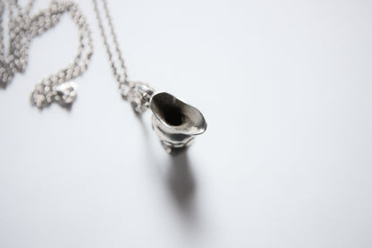 Lot 136: Jug Pendant